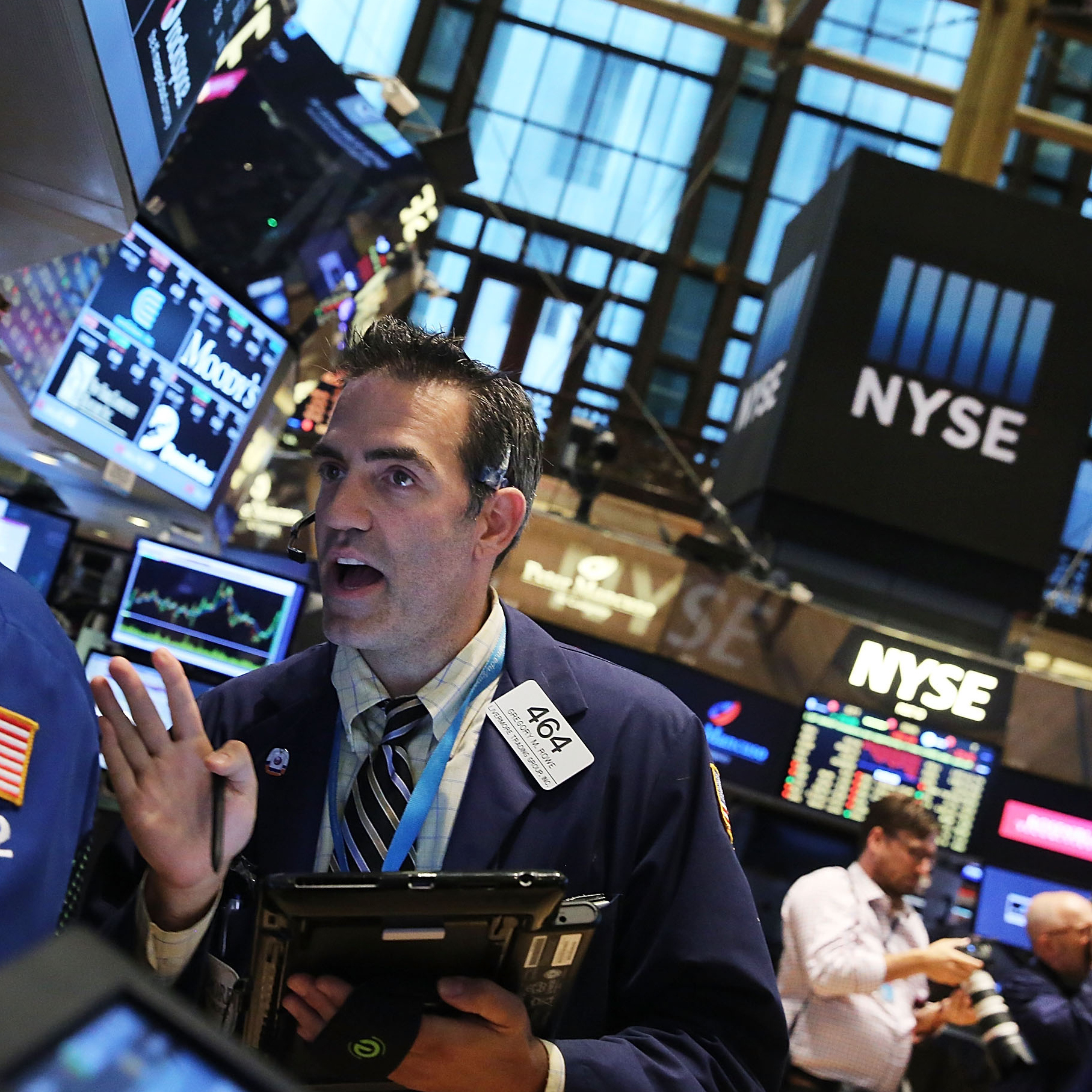 Traders work on the floor of the New York Stock Exchange on Friday. The Dow Jones industrial average dropped 531 points, or more than 3 percent.