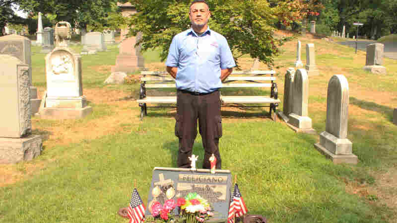 Feliciano stands at the gravesite of his wife, Rosa. "She's buried here," he says. "So Green-Wood Cemetery is ground zero for me."