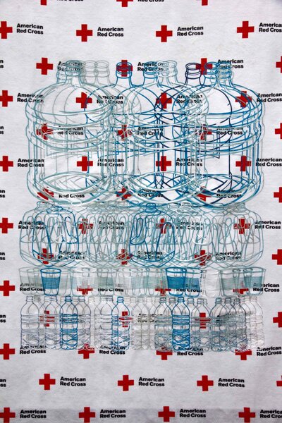 After Superstorm Sandy, Saucedo used aid materials from the Red Cross to create Red Cross Blanket Family Portrait as Water.(Courtesy of Christopher Saucedo and LeMieux Gallery, New Orleans) After Superstorm Sandy, Saucedo used aid materials from the Red Cross to create Red Cross Blanket Family Portrait as Water.(Courtesy of Christopher Saucedo and LeMieux Gallery, New Orleans)