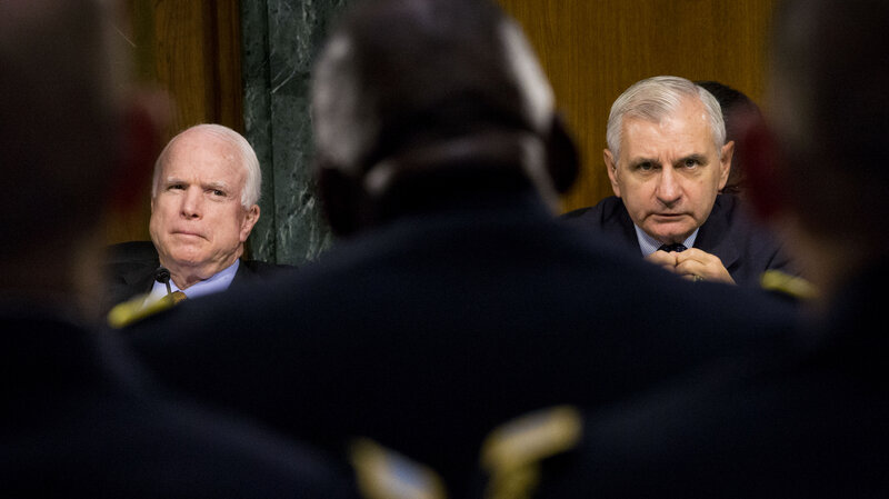 Sens. John McCain, R-Ariz., (left) and Jack Reed, D-R.I., hear testimony on operations against ISIS from Gen. Lloyd Austin.