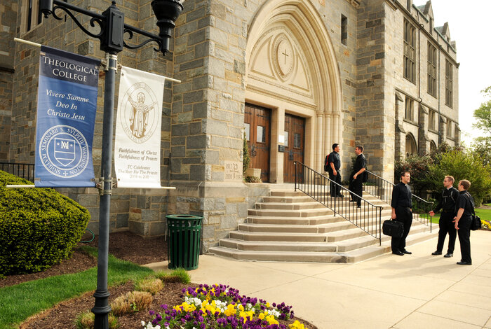 Seminarians greet each other outside Theological College, the national seminary of The Catholic University of America in Washington, D.C. (Ed Pfueller/Courtesy of The Catholic University of America)