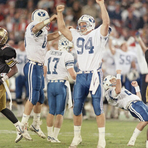 Chaffetz, right, in 1988, then a kicker for BYU, falling to the ground after kicking the winning field goal against Colorado in the Freedom Bowl. (Reed Saxon/AP)