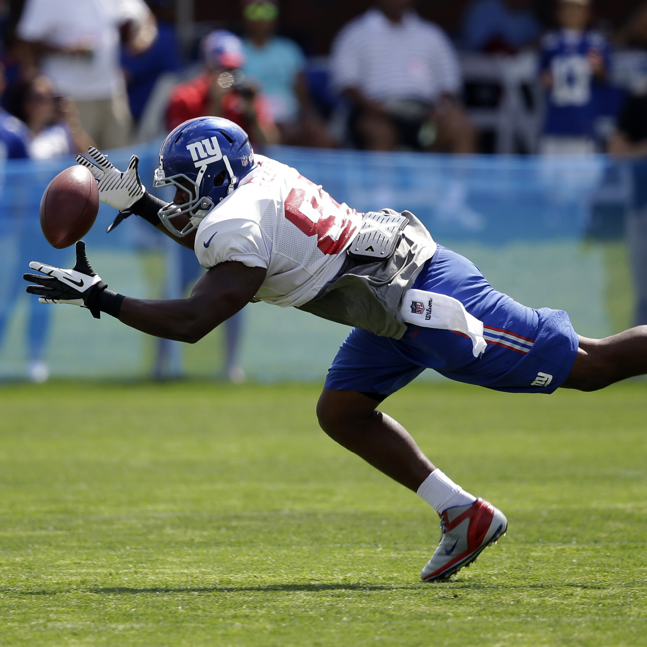 New York Giants' Daniel Fells makes a catch during a practice at NFL football training camp in August. Fells is currently suffering from a serious MRSA infection; it is unclear if he will return to football.