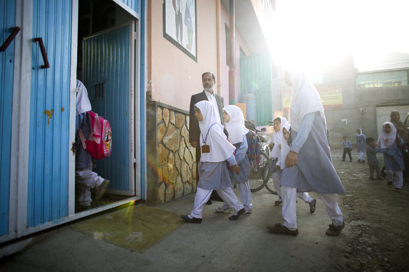 This is something you never would have seen under the Taliban: Girls walking to school. (David Gilkey/NPR)