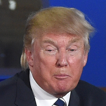 Republican presidential candidates Donald Trump, left speaks at a Republican presidential debate last month, as former Florida Gov. Jeb Bush listens.