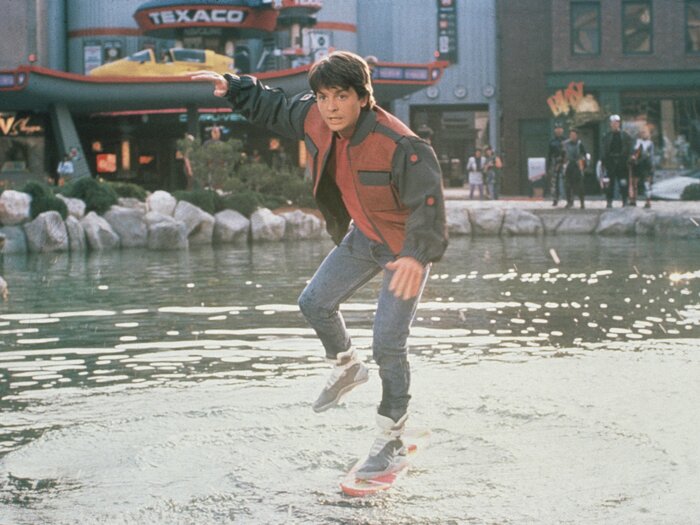 In Back to the Future Part II, Marty McFly (Michael J. Fox) slips on his Nike sneakers and rides a Mattel hoverboard in front of a Texaco gas station. (Courtesy of The Kobal Collection) In Back to the Future Part II, Marty McFly (Michael J. Fox) slips on his Nike sneakers and rides a Mattel hoverboard in front of a Texaco gas station.