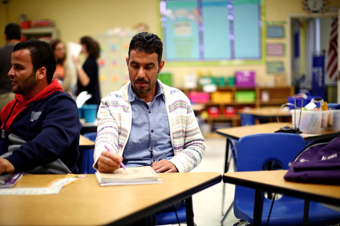 Omar attends an English as a second language class offered by the Water for Ishmael, a Christian organization in Toledo. (David Gilkey/NPR) Omar attends an English as a second language class offered by the Water for Ishmael, a Christian organization in Toledo.