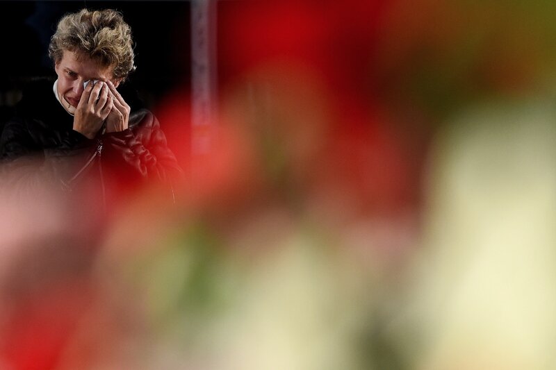 A woman mourns at a makeshift memorial for the victims of a jetliner crash outside Pulkovo International Airport in St. Petersburg on Tuesday. (Vasily Maximov /AFP/Getty Images)