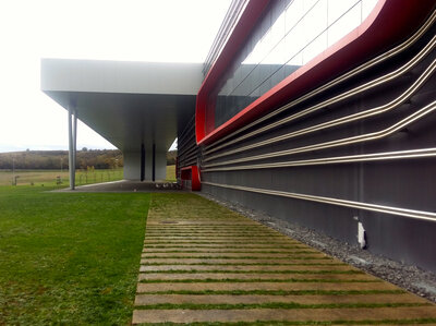 Outside of the abandoned headquarters of Epsilon Euskadi, one of the companies tasked with building the Hiriko car in Spain. The consortium's parent company, Afypaida, went out of business in 2013. Several sources told NPR that the Hiriko prototype was kept here, in an industrial park outside the Basque city of Vitoria-Gasteiz. But the building is empty now. Outside of the abandoned headquarters of Epsilon Euskadi, one of the companies tasked with building the Hiriko car in Spain. The consortium's parent company, Afypaida, went out of business in 2013. Several sources told NPR that the Hiriko prototype was kept here, in an industrial park outside the Basque city of Vitoria-Gasteiz. But the building is empty now.