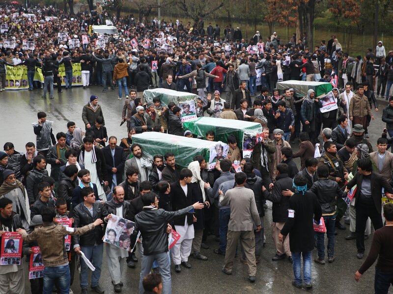 Protesters march through the Afghan capital of Kabul on Wednesday, carrying the coffins of seven ethnic Hazaras who were allegedly killed by the Taliban. The demonstrators called for justice and for a government that can ensure security in the country. Protesters march through the Afghan capital of Kabul on Wednesday, carrying the coffins of seven ethnic Hazaras who were allegedly killed by the Taliban. The demonstrators called for justice and for a government that can ensure security in the country.