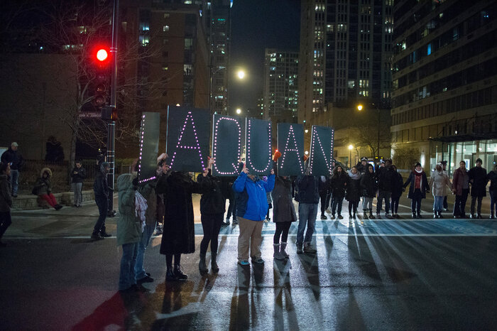 Demonstrators march through downtown Chicago on Tuesday following the release of a video showing Jason Van Dyke, a police officer, shooting and killing Laquan McDonald. Van Dyke is charged with first-degree murder for the October 2014 shooting in which McDonald was hit with 16 bullets. So far this year, 15 officers have been charged with murder or manslaughter resulting from an on-duty shooting. (Scott Olson/Getty Images)