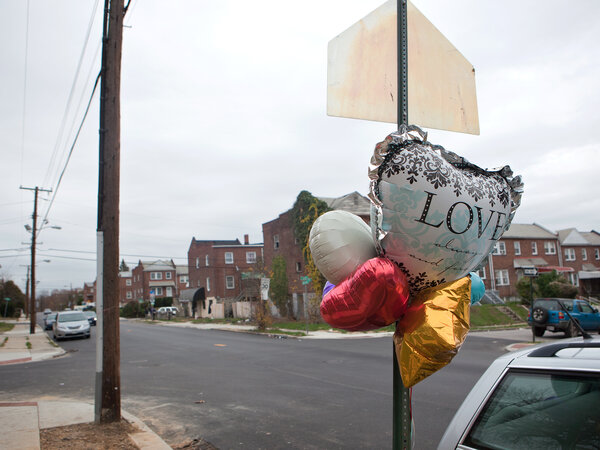 A memorial is seen on West Baltimore street at the site of the city's 300th homicide this year, Wednesday, Nov. 19, 2015 in Baltimore, MD. (Jun Tsuboike/NPR)