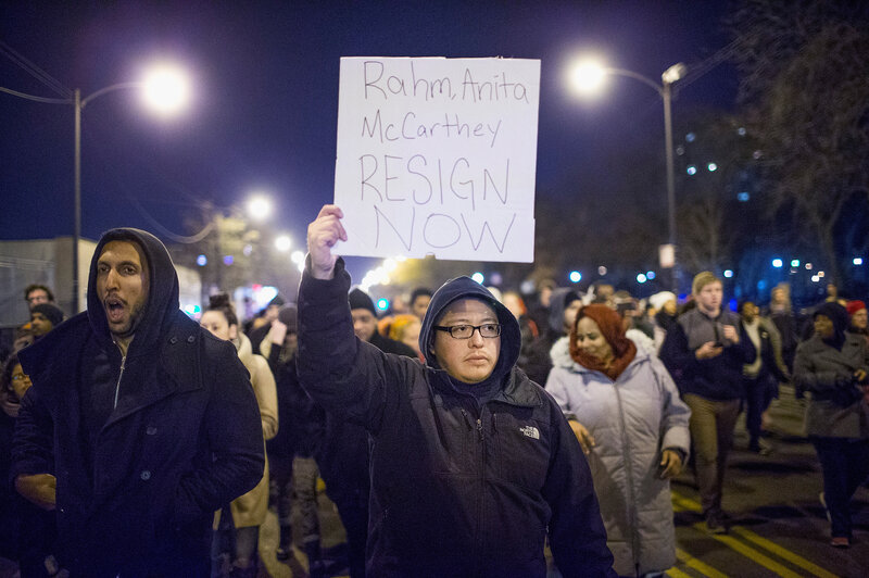 Demonstrators call for the resignation of Chicago Mayor Rahm Emanuel, Police Superintendent Garry McCarthy and Cook County State's Attorney Anita Alvarez during a protest on Nov. 24 following the release of a video showing Chicago police officer Jason Van Dyke shooting and killing teenager Laquan McDonald. (Scott Olson/Getty Images)