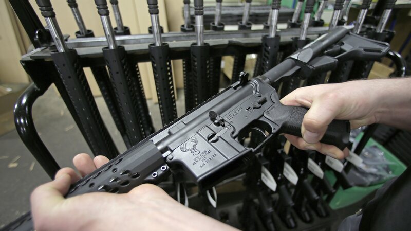 Chicago suburb Highland Park banned the possession of what it called assault weapons, including AR-15s, like this one, and AK-47s, as well as large capacity magazines. Gun rights advocates challenged the ban, contending that it violated the Second Amendment's guarantee of a right to bear arms. (Charles Krupa/AP) Chicago suburb Highland Park banned the possession of what it called assault weapons, including AR-15s, like this one, and AK-47s, as well as large capacity magazines. Gun rights advocates challenged the ban, contending that it violated the Second Amendment's guarantee of a right to bear arms. (Charles Krupa/AP)