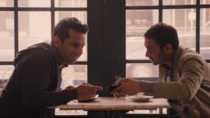 Dev (Aziz Ansari) tells Ravi (Ravi Patel) that the "Indian" actor Ravi's admired is actually a white guy in brown face.