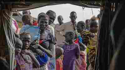 South Sudanese seeking refuge line up to register at the U.N.'s base in Bentiu in February. At that time, the camp was receiving up to 200 new people a day. It now serves as home to some 100,000 people.