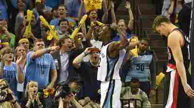 Fans of the Memphis Grizzlies, seen here celebrating with Jeff Green, made only 2.47 grammar mistakes for every 100 words  according to a new study.
