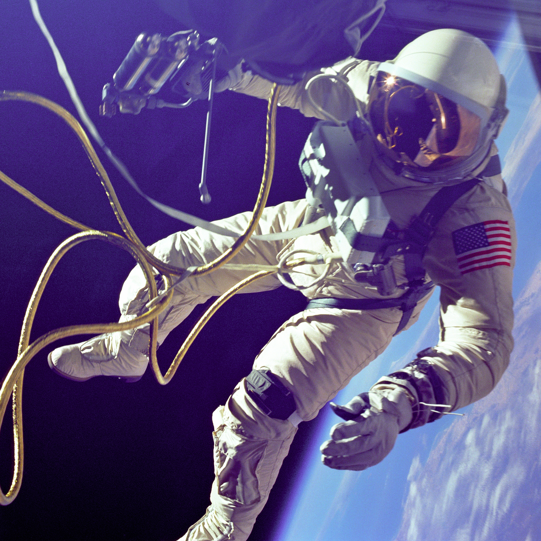 Ed White completes the first American space walk in 1965.