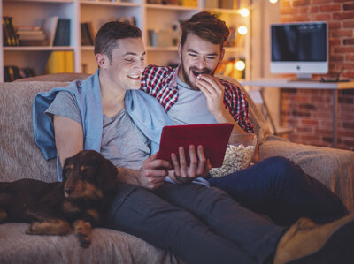 With just a little bit of work, your friends' movie night, too, can be just as fun. Cute dog not included. (Svetikd/iStockphoto)