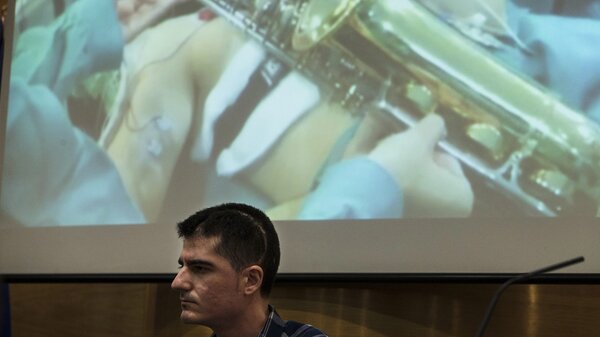 Carlos Aguilera recently discussed how he played the saxophone during surgery to remove a brain tumor at Regional Hospital of Malaga, in Andalusia, Spain. (Jorge Zapata/EPA /LANDOV)