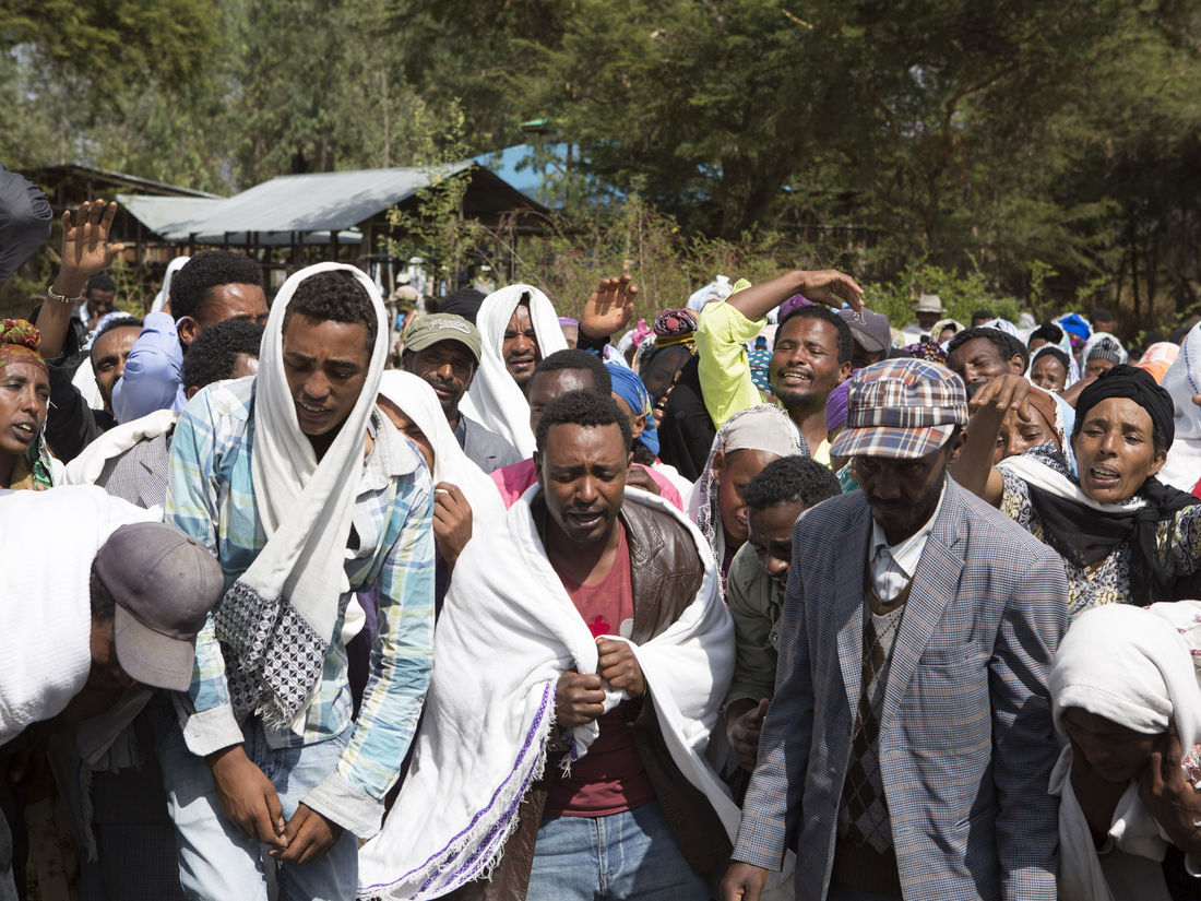 People mourn the death of Dinka Chala who was shot dead by the Ethiopian forces the day earlier, in the Yubdo Village, about 100 km from Addis Ababa in the Oromia region, on Dec. 17, 2015. People mourn the death of Dinka Chala who was shot dead by the Ethiopian forces the day earlier, in the Yubdo Village, about 100 km from Addis Ababa in the Oromia region, on Dec. 17, 2015.