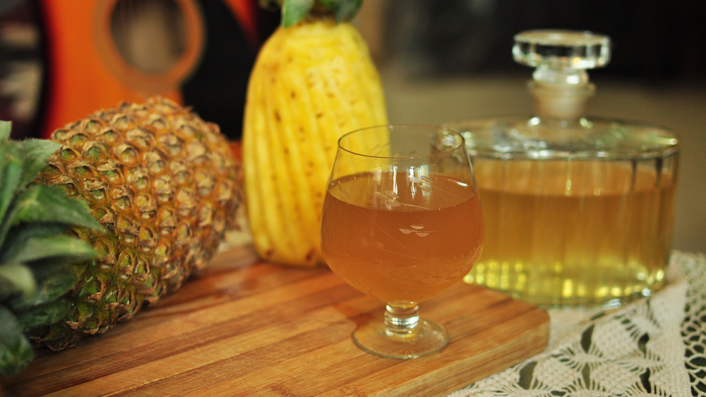 Across India, several Christian communities prepare sweet homemade wines for the festive season from a rich array of local fruit, roots and grain. Above, a glass of golden pineapple wine.