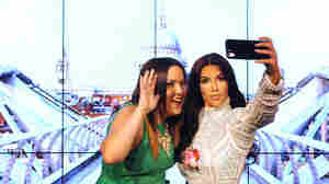 Art imitates life in this 2015 addition to London's Madame Tussauds: a wax figure of Kim Kardashian, taking a selfie — naturally.