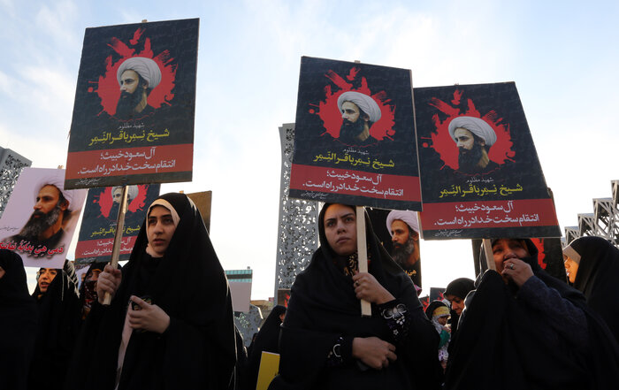 Iranian women in the capital Tehran demonstrate against the execution of a prominent Shiite Muslim cleric Nimr al-Nimr, as seen on the signs. He was among 47 people beheaded by Saudi authorities on Saturday, a move that escalated tensions between the two countries. (Atta Kenare/AFP/Getty Images)