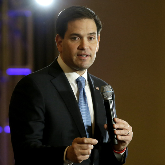 Republican presidential candidates Marco Rubio (left) and Jeb Bush (right) on recent campaign stops in Iowa.