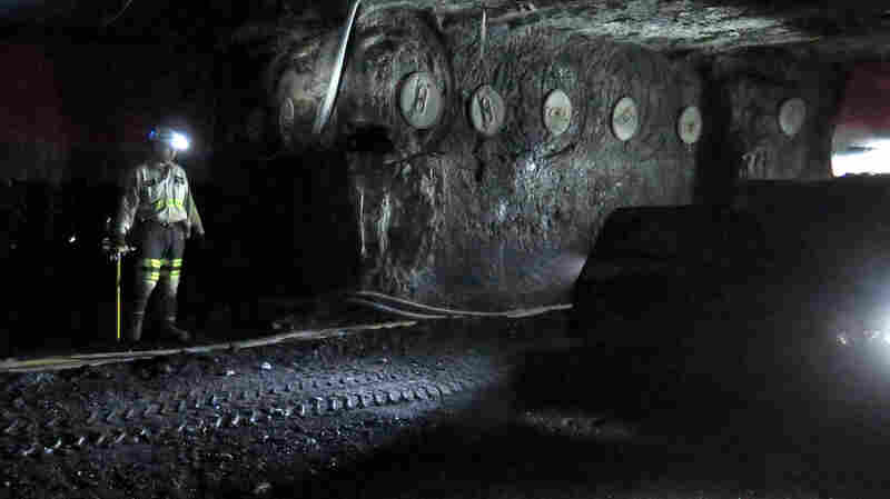 A coal miner stands in the Dotiki mine, operated by Alliance Coal, in Webster County, Ky.