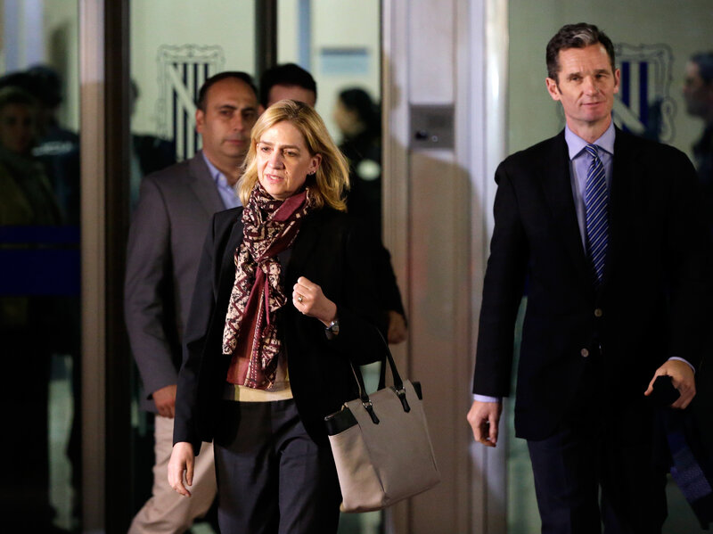Spain's Princess Cristina and husband, Inaki Urdangarin (right), leave a makeshift courtroom on Monday, the first day of a corruption trial. She is accused of tax fraud and is the first member of Spain's royal family to face criminal charges.