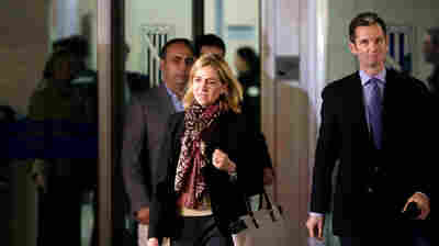 Spain's Princess Cristina and husband, Inaki Urdangarin (right), leave a makeshift courtroom on Monday, the first day of a corruption trial. She is accused of tax fraud and is the first member of Spain's royal family to face criminal charges.