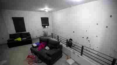 Bullet holes riddle the walls of the second floor of the home that marines raided in their search for the Mexican drug lord Joaquin "El Chapo" Guzmán.