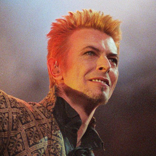 David Bowie performs during a concert celebrating his 50th birthday, on Jan. 9, 1997, at Madison Square Garden in New York City.