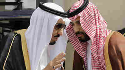 Saudi Arabia's King Salman (left) speaks with his son Mohammed in the capital Riyadh in 2012. The king was the crown prince at the time. When he assumed the throne last year, Salman named Mohammed, now 30, the deputy crown prince and defense minister. They have pursued a much more aggressive foreign policy in the region, particularly when it comes to confronting Iran.
