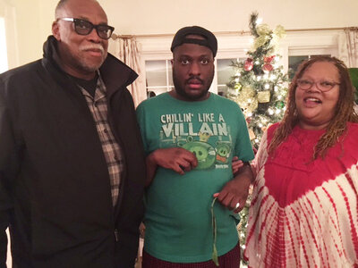 Ronald Hampton, his son Quintin and wife Quintina Hampton pose for a family picture. (Courtesy of Quintina Hampton)