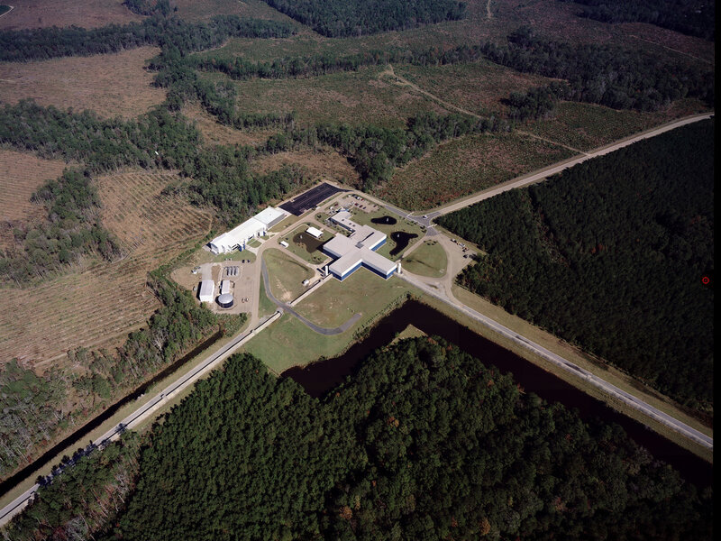 The Laser Interferometer Gravity-Wave Observatory measures tiny changes in the lengths each of its 2.5 mile-long arms. The arms stretch and squeeze as gravity waves pass by. (Caltech/MIT/LIGO Lab)