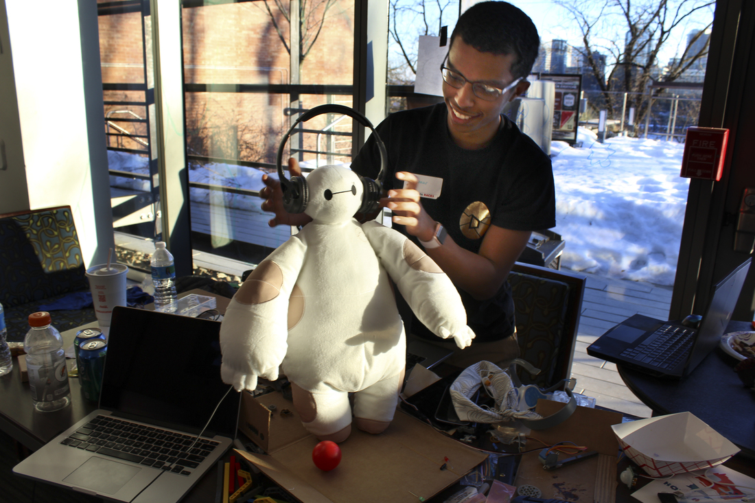 Ammar Al-Kahfah plays with a stuffed "Baymax" toy at the Georgetown Hackathon in Washington, D.C. His team has wired it to move and to collect basic medical information. Ammar Al-Kahfah plays with a stuffed "Baymax" toy at the Georgetown Hackathon in Washington, D.C. His team has wired it to move and to collect basic medical information.
