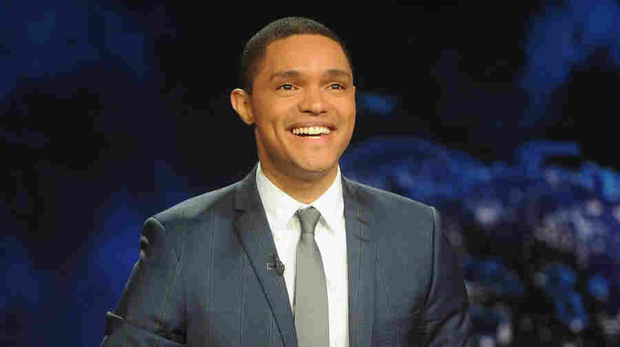 Trevor Noah — who took over hosting from Jon Stewart in 2015 — remembers watching The Daily Show on CNN in South Africa. "It looked like a news show and it had the same colors as CNN and the ticker," he says. "I just worked under the assumption that it was part of the news programming. ...I thought that Jon Stewart was a news anchor who didn't take his job seriously."