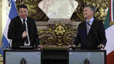Italian Prime Minister Matteo Renzi (left) talks to the media alongside Argentine President Mauricio Macri in Buenos Aires on Tuesday. Renzi has inspired some mockery in the Italian press for reciting a poem he claimed was by Jorge Luis Borges, which, well, wasn't.