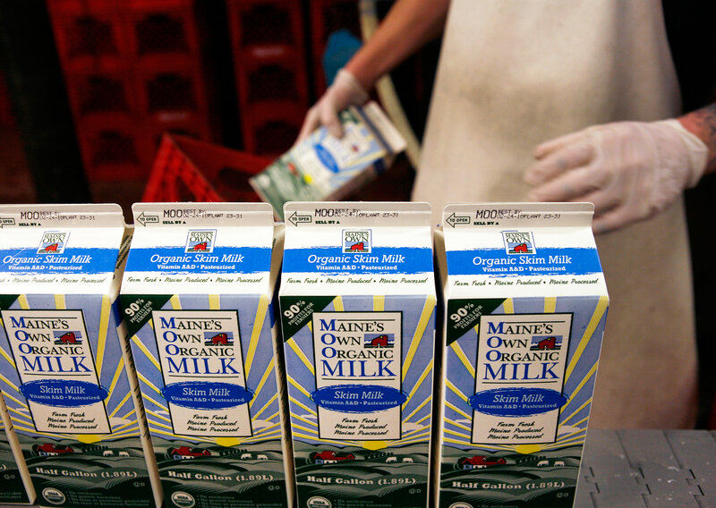 Organic milk is processed at a dairy farm in Westbrook, Maine. A new meta-analysis finds that organic milk contains significantly more omega-3 fatty acids than its conventional counterpart. (Pat Wellenbach/AP)