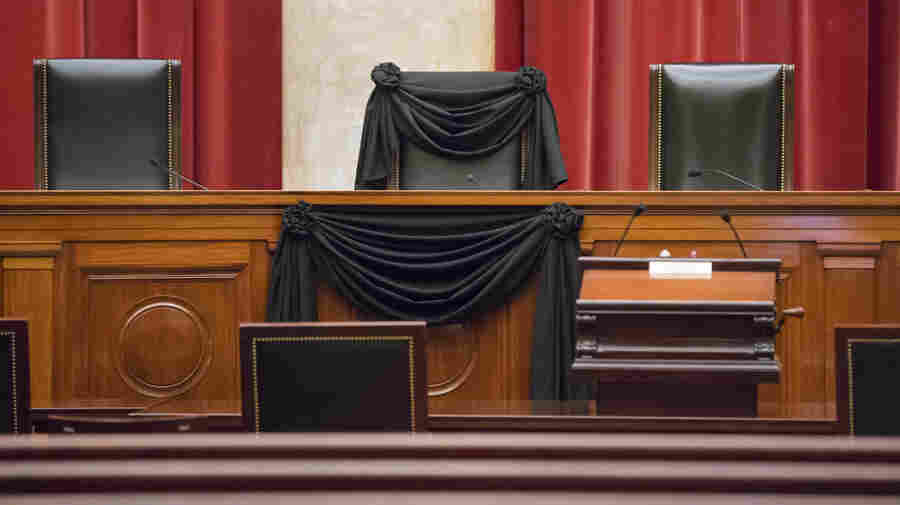 Supreme Court Justice Antonin Scalia's courtroom chair is draped in black to mark his death. It is part of a tradition that dates to the 19th century.