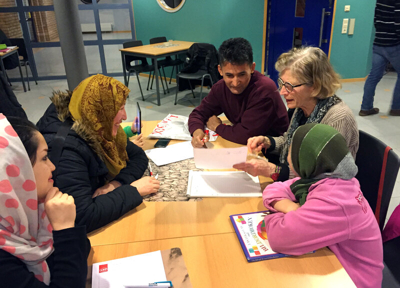 Swedish volunteer Mia Gustafsson, 77, helps families from Afghanistan learn Swedish.