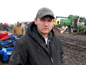 Colten Josoff, 23, of Louisville, Neb. works a full-time off-farm job, because farming his land doesn't pay enough by itself.