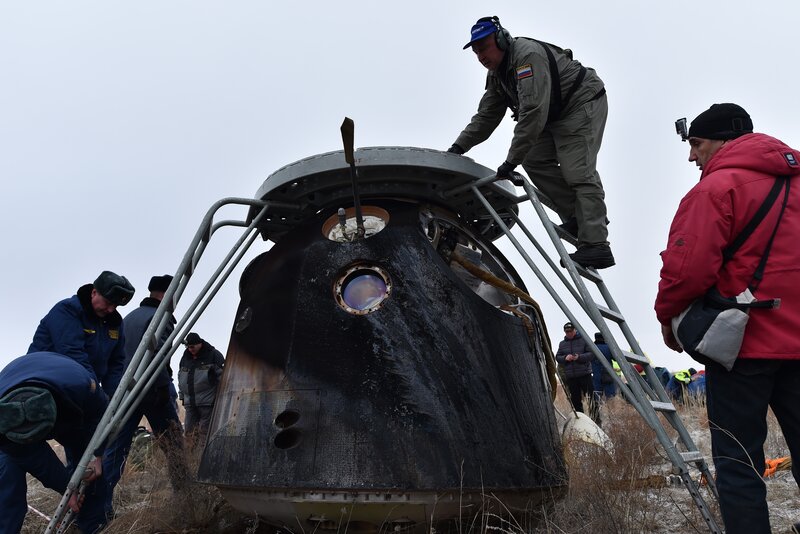 A search and rescue team works at the site where the capsule landed. (Kirill Kudryavtsev/AFP/Getty Images)