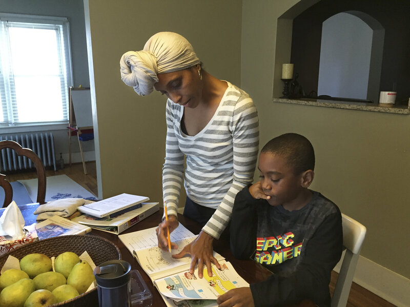 Camille Kirksey helps Brandon with math at the dining room table. Kirksey says black children at Brandon's private pre-K weren't given the kindness she thought they needed, so she decided to home-school him. Camille Kirksey helps Brandon with math at the dining room table. Kirksey says black children at Brandon's private pre-K weren't given the kindness she thought they needed, so she decided to home-school him.