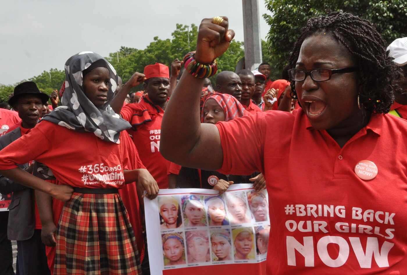 People take part in a march outside the presidential residence in Abuja in 2015, part of the Bring Back Our Girls campaign, in memory of girls abducted by Nigerian extremists. People take part in a march outside the presidential residence in Abuja in 2015, part of the Bring Back Our Girls campaign, in memory of girls abducted by Nigerian extremists.