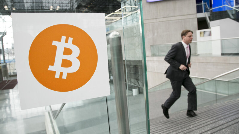 Entrepreneur Craig Wright says he is the creator of the bitcoin crypto-currency. In this 2014 file photo, a man arrives for the Inside Bitcoins conference and trade show in New York.