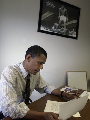Barack Obama in 2004, then a candidate for U.S. Senate, reading through a copy of his keynote speech to the Democratic National Convention below a photo of Muhammad Ali at his campaign office in Chicago, Ill. Barack Obama in 2004, then a candidate for U.S. Senate, reading through a copy of his keynote speech to the Democratic National Convention below a photo of Muhammad Ali at his campaign office in Chicago, Ill.