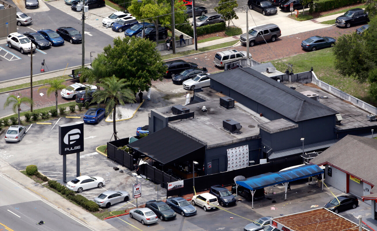 Law enforcement officials work at the scene of the Pulse Orlando nightclub. Law enforcement officials work at the scene of the Pulse Orlando nightclub.